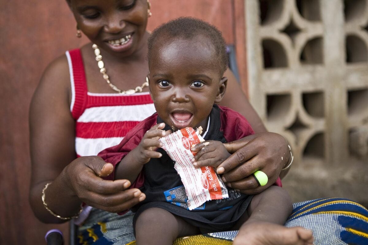 After receiving treatment for severe malnutrition, Samba returned home healthy and thriving with his family in Mali.