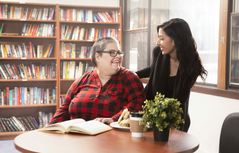 YWCA Hamilton Will Power program, an elderly woman smiling at her daughter