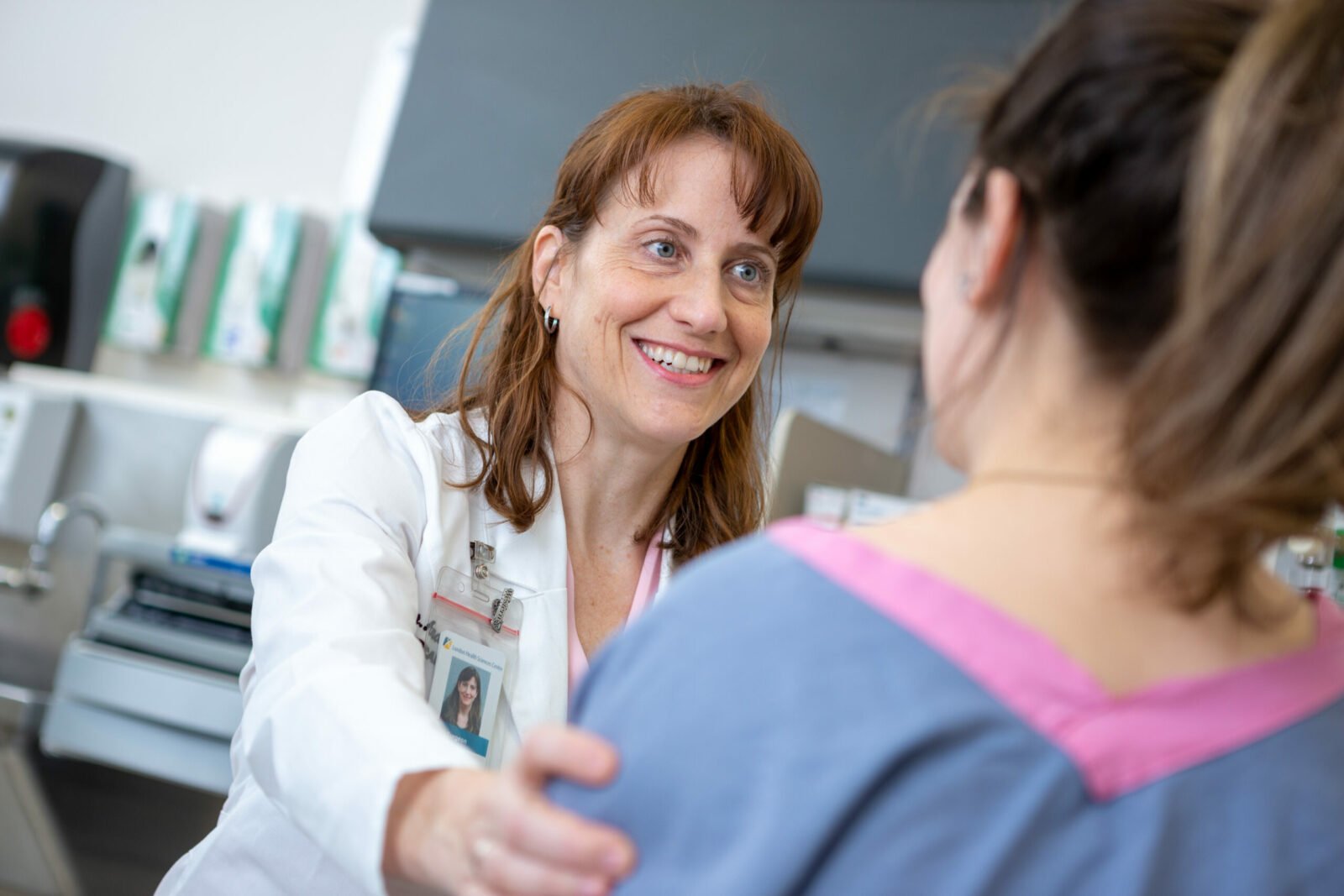 physician caring for patient