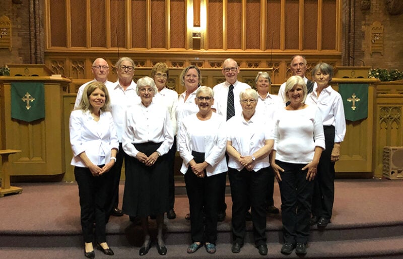 London Symphonia's volunteer ushers gather for their annual photo after a classical music concert in London, Ontario