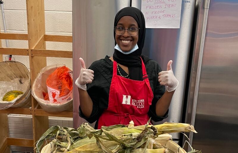 North York Harvest Food Bank staff distributing fresh corn