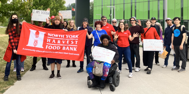 North York Harvest Food Bank community members, volunteers, and staff outside food space