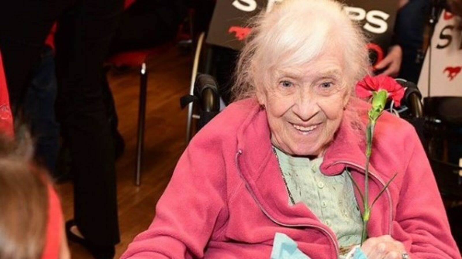 Senior in Wheelchair with Child
