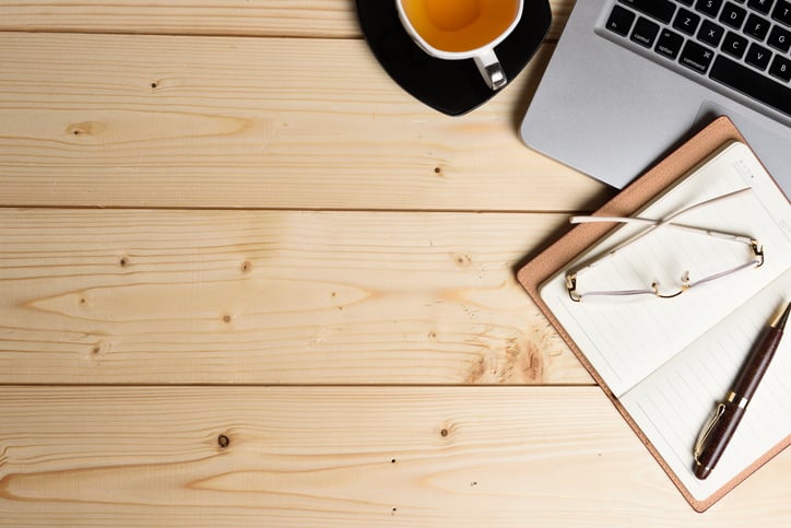 A Laptop, notebook and coffee