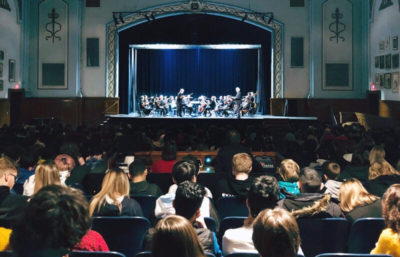 The musicians of London Symphonia performs a classical music concert for nearly 2000 students in London, Ontario.