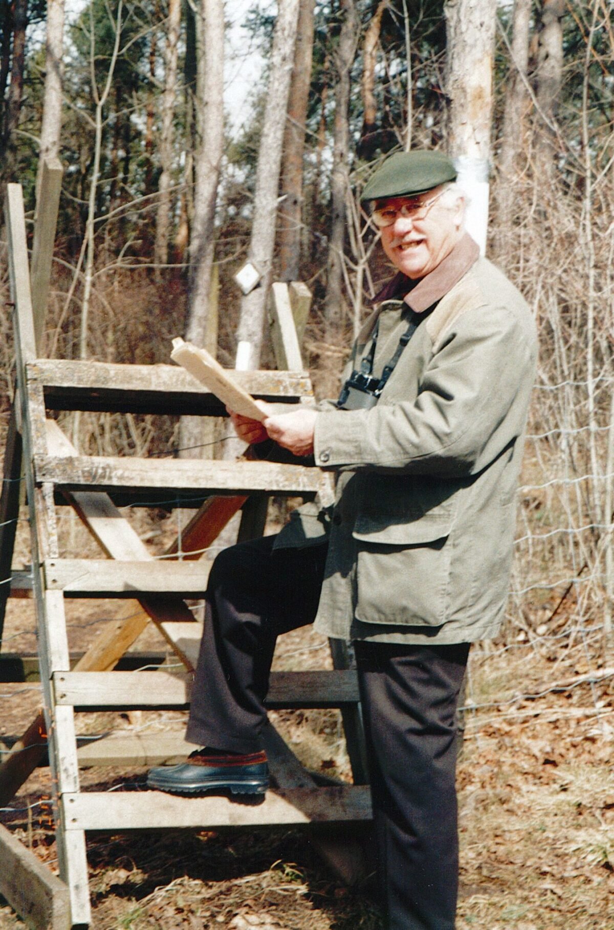 Dr. Philip R. Gosling, Honorary President & Co-Founder, standing at a stile on the Bruce Trail. Dr. Gosling has shared his decision to include a gift to the Bruce Trail Conservancy in his will.