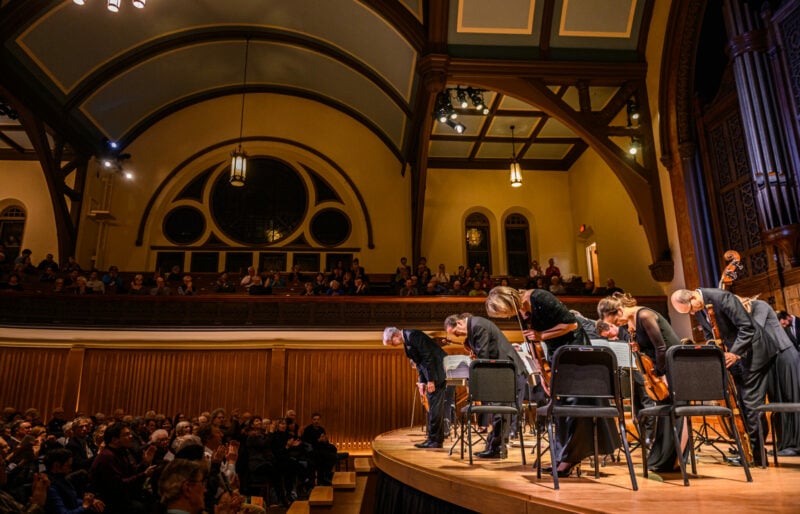 musicians bow to the audiences