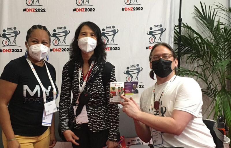 Tammy Yates-Rajaduray (Realize), Dr. Theresa Tam (Canada's Chief Public Officer of Health , and Daniel Sands (Realize Board member in wheelchair) at the 2022 International AIDS conference in Montreal