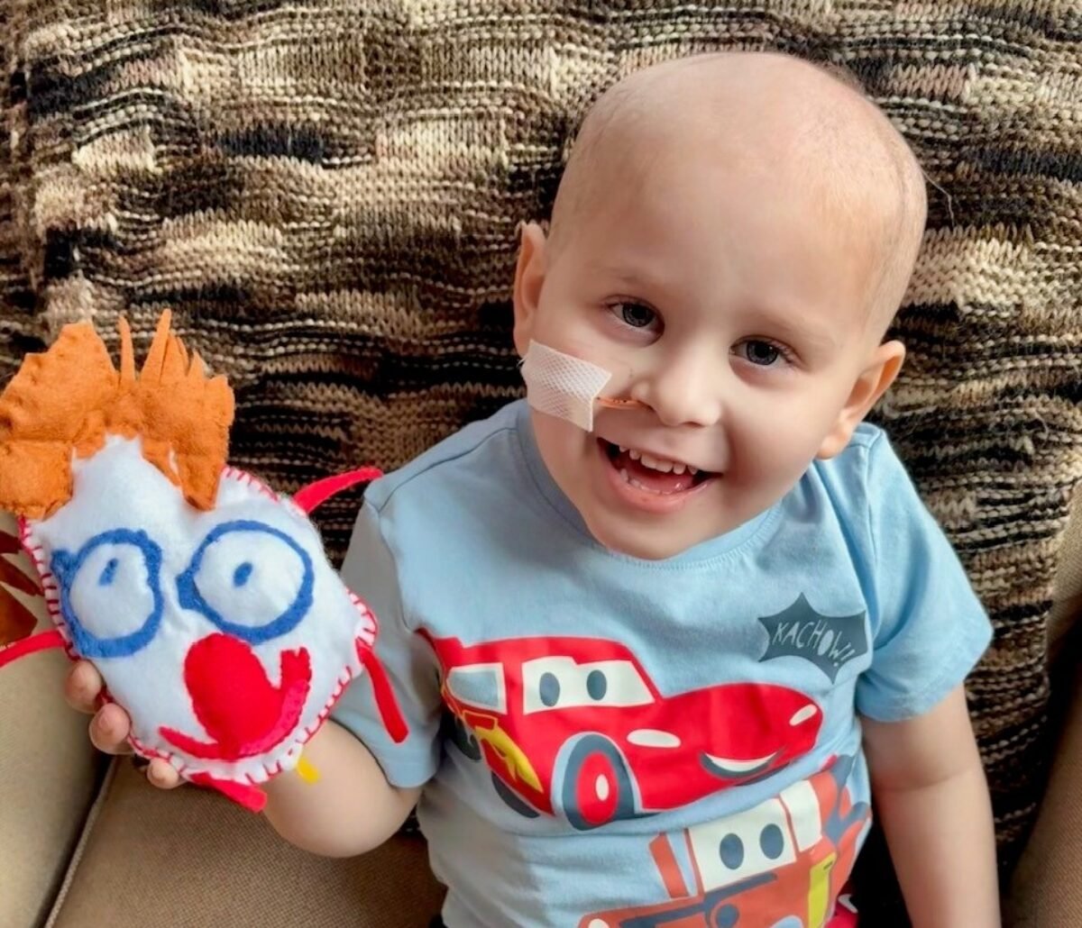 A young boy and his stuffie